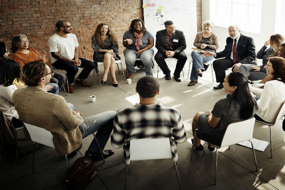 team discussion in a circle