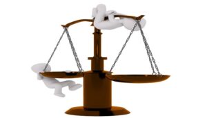 scale with 2 animated people hanging on it