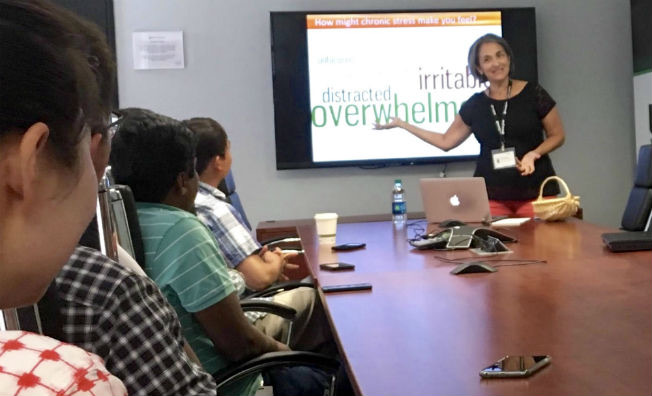 Terre teaching a team about mindful stress management