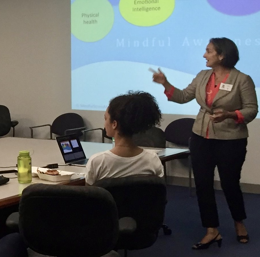 Terre teaching in front of group